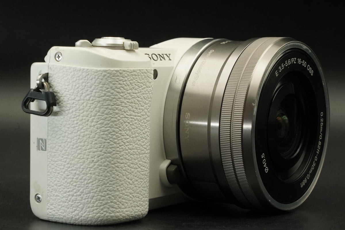 Sony a5100 Digital Camera White with 14-42mm + 55-210mm Lens -34090 cuts- #12365