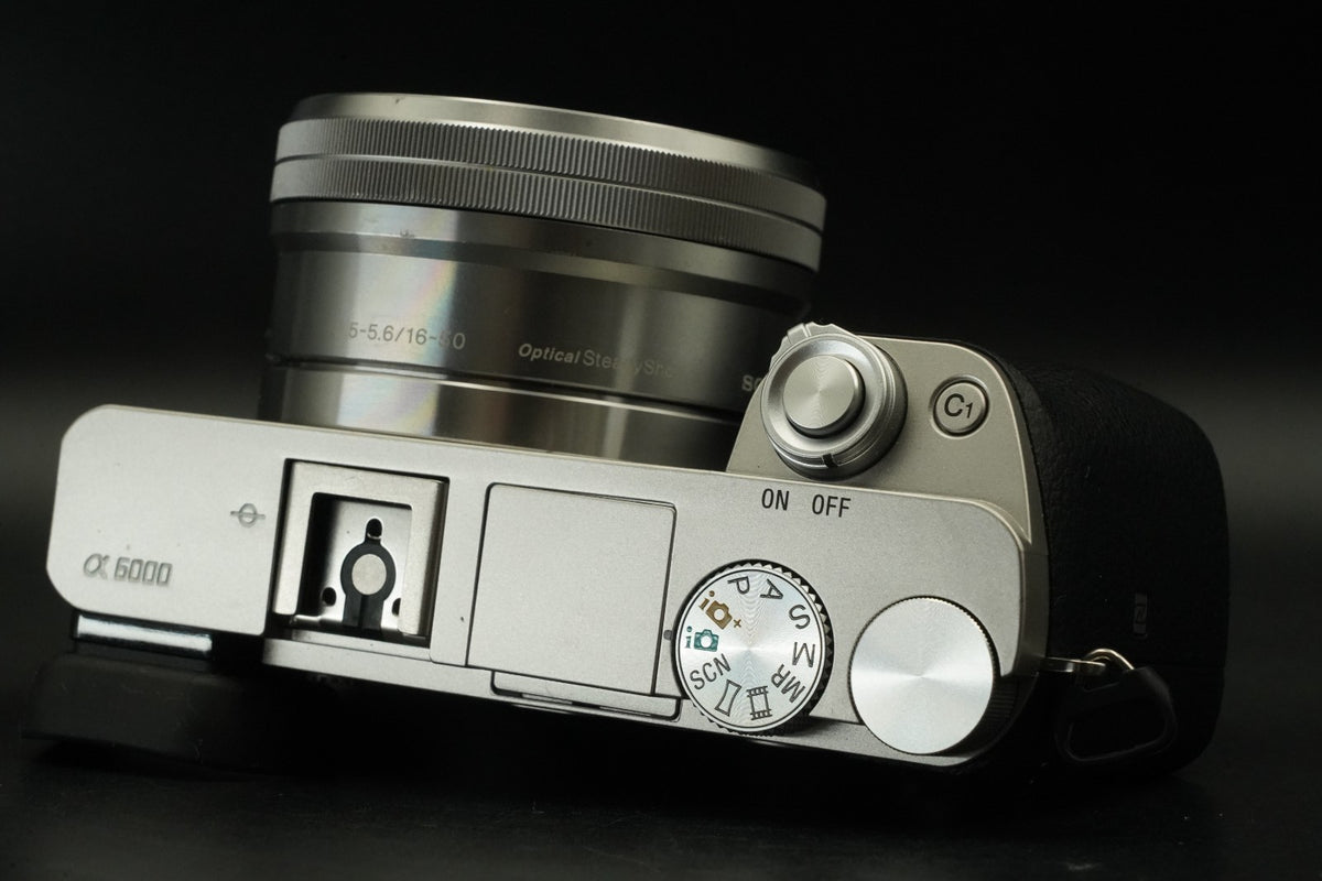 Sony a6000 Digital Mirrorless Camera Silver w/ 16-50mm Lens -778 cut- #12533