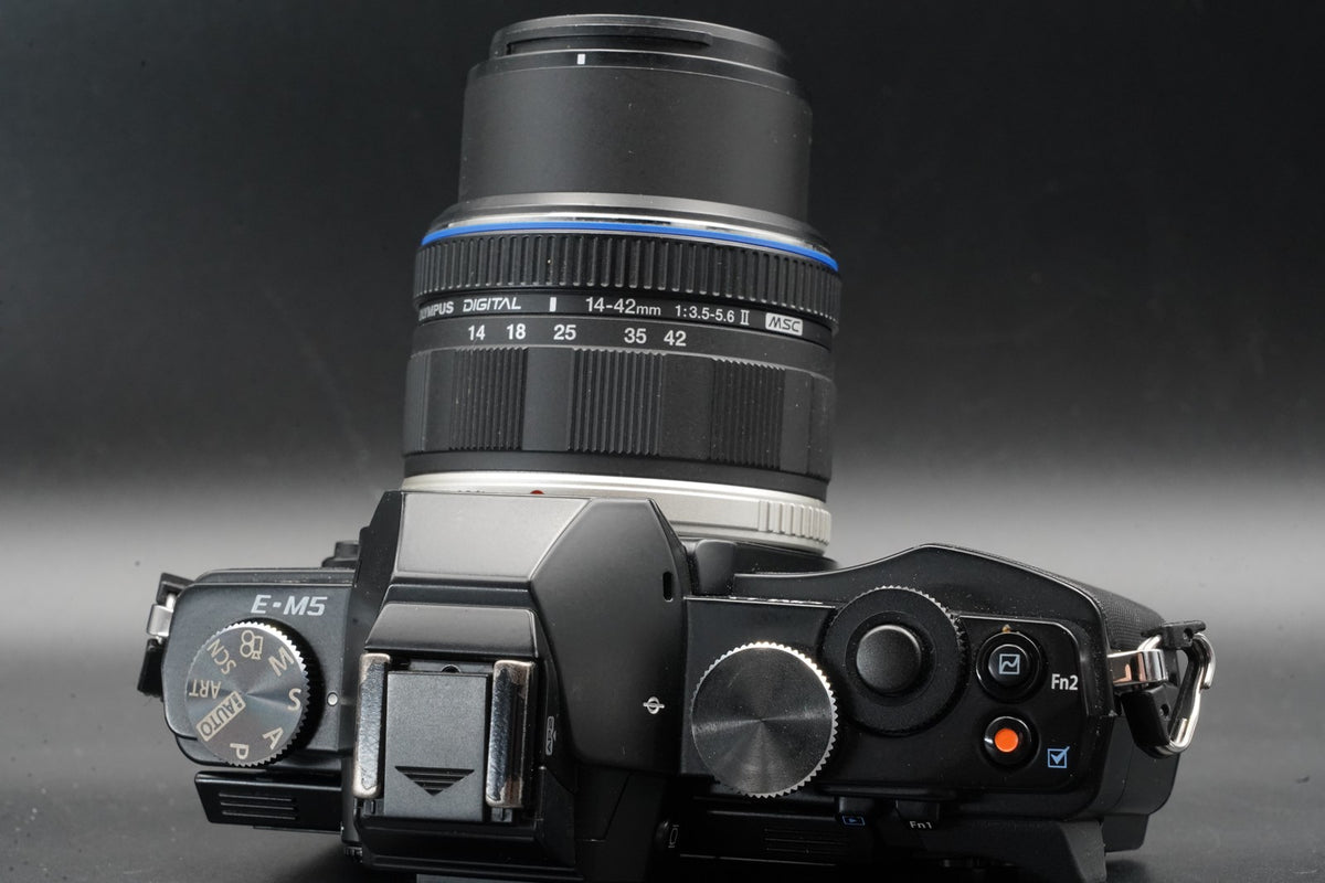 Olympus E-M5 Mirrorless Digital Camera w/ 2 Lenses Black -5447 cut- #11365