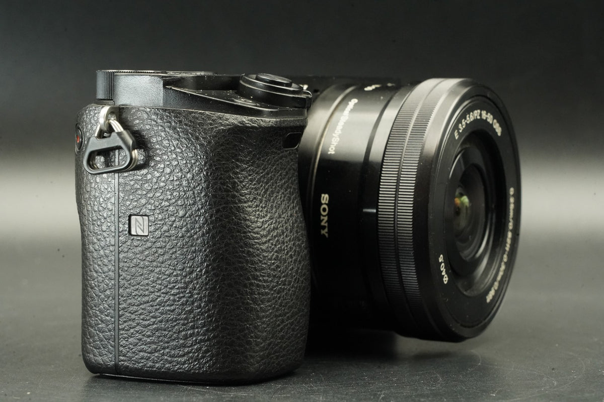 Sony a6000 Digital Mirrorless Camera Black w/ 16-50 + 55-210mm -29474 cut #12009
