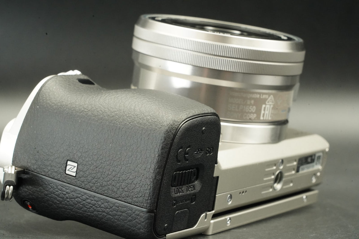 Sony a6000 Digital Mirrorless Camera Silver w/ 16-50mm Lens -3320 cut- #12564