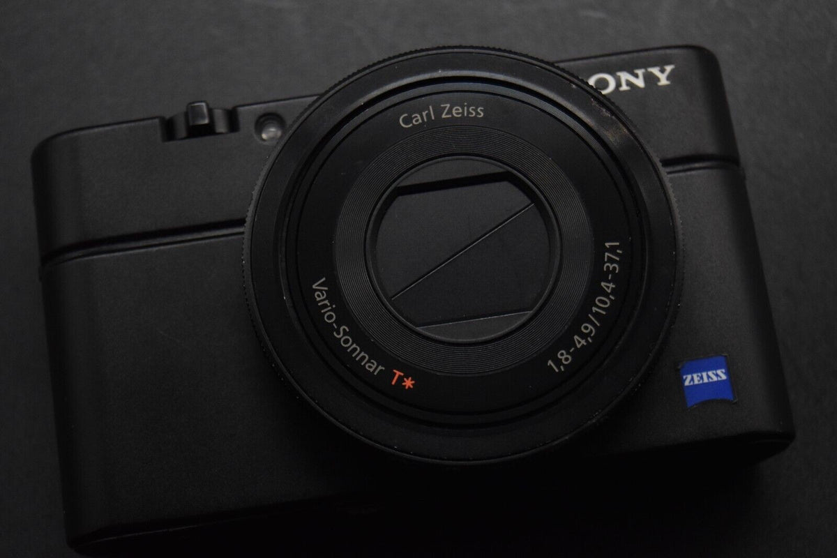 Sony Cyber-Shot DSC-RX100 35 Language Camera #11933-11934