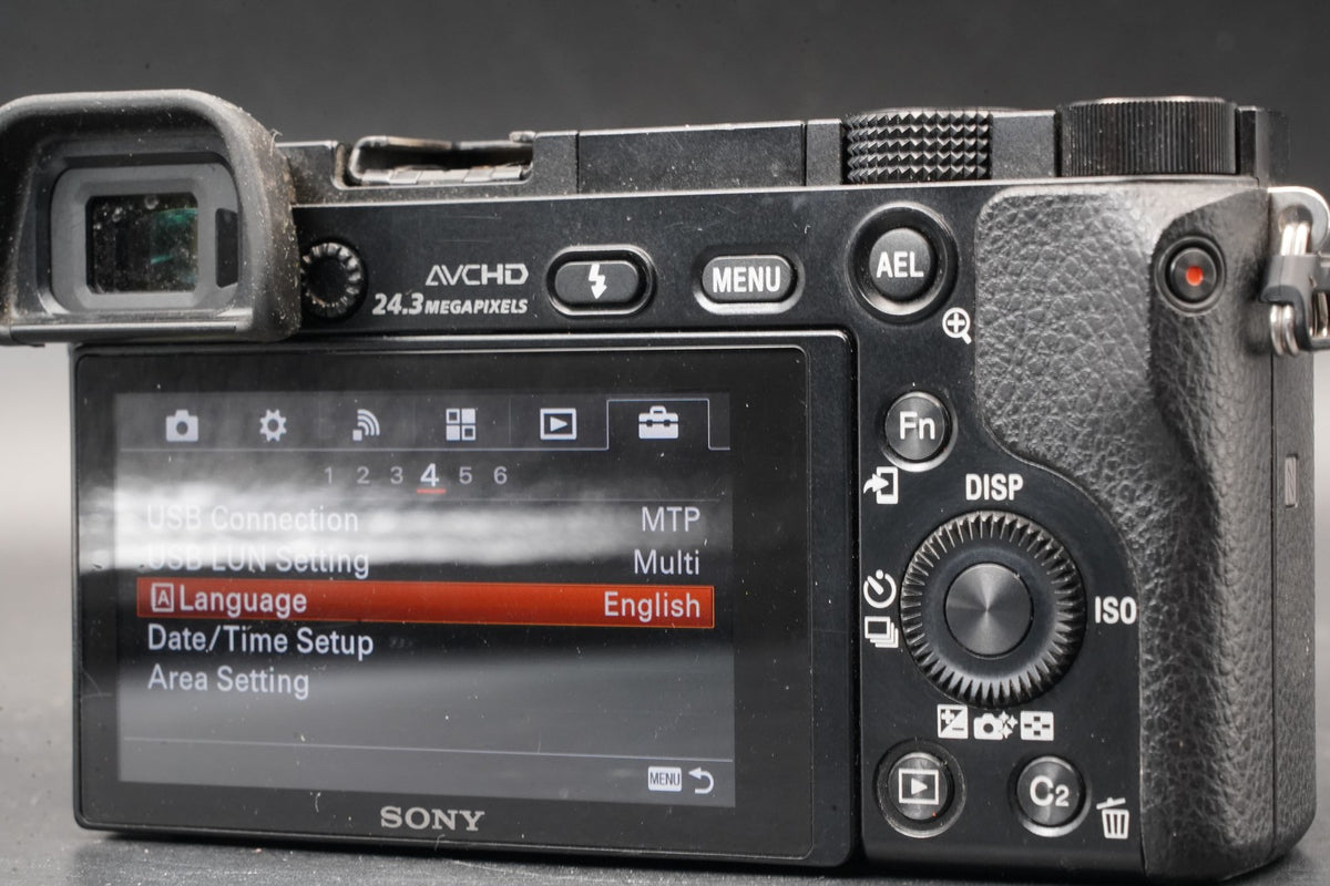 Sony alpha a6000 Digital Mirrorless Camera with Lens Black -75302 cuts- #11206
