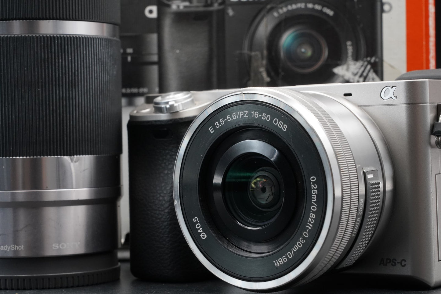 2374 cuts! Sony a6000 Digital Mirrorless Camera Silver w/ 16-50 + 55-210mm 11485