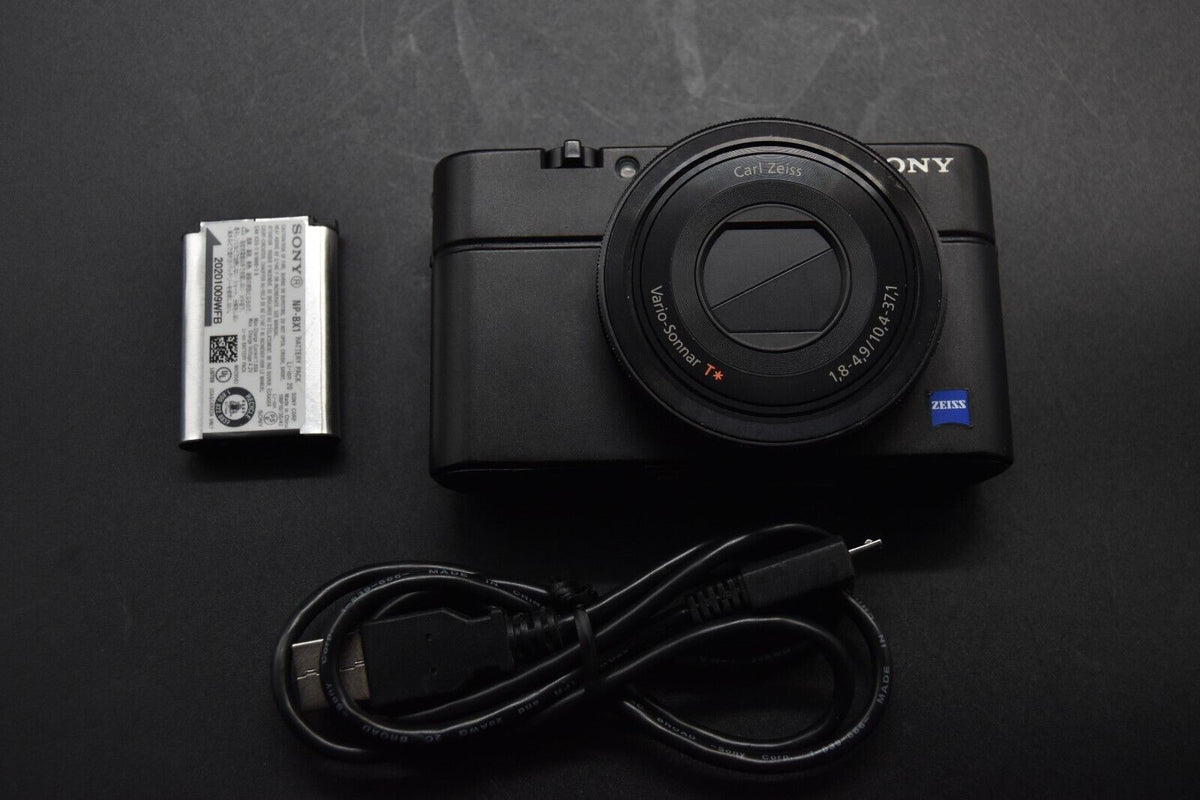 Sony Cyber-Shot DSC-RX100 35 Language Camera #11933-11934