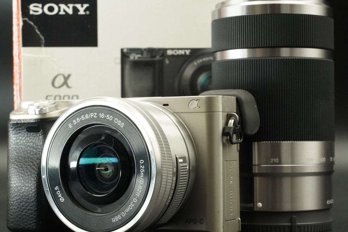 Sony a6000 Digital Camera Silver w/ 16-50 + 55-210mm -9333 cut- #12447
