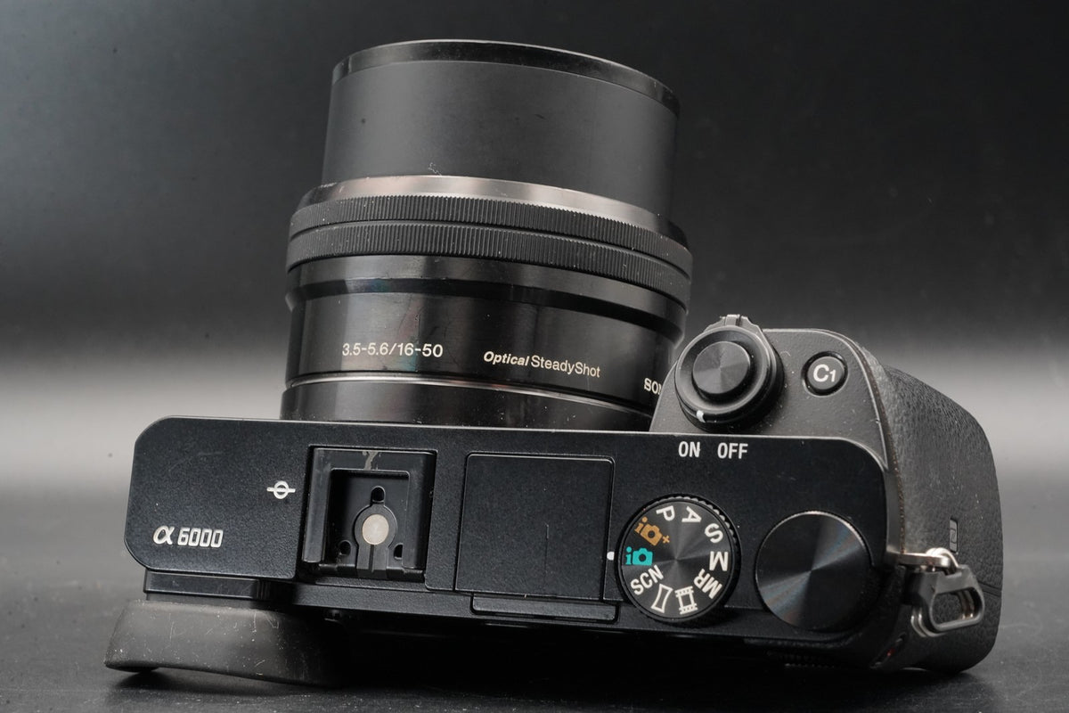 Sony alpha a6000 Digital Mirrorless Camera with Lens Black -75302 cuts- #11206