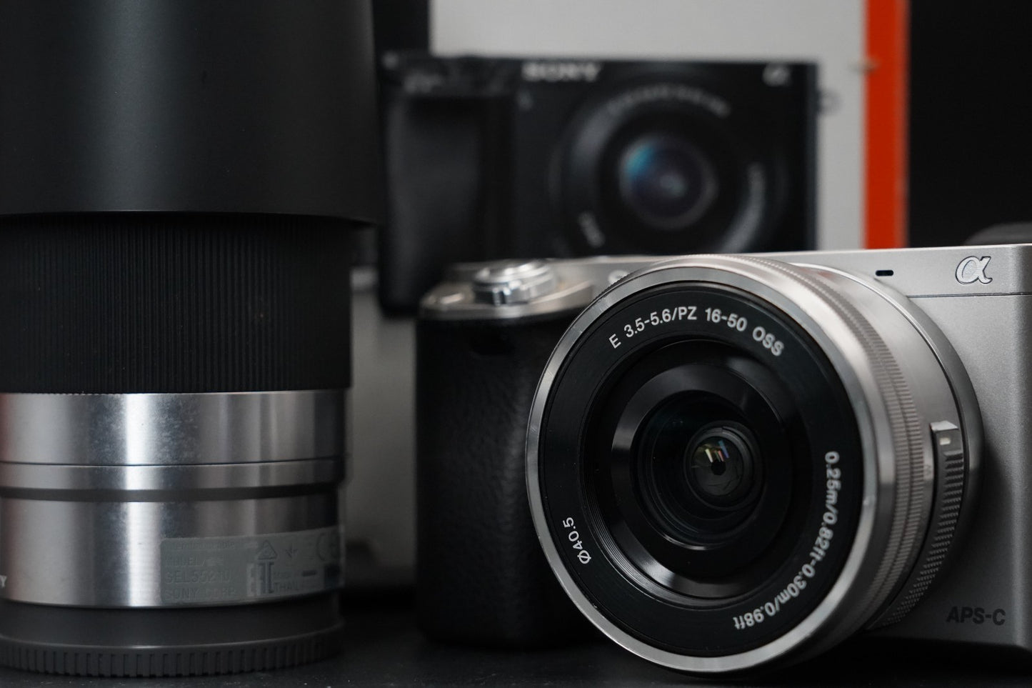 3411 cuts! Sony a6000 Digital Mirrorless Camera Silver w/ 16-50 + 55-210mm 10371