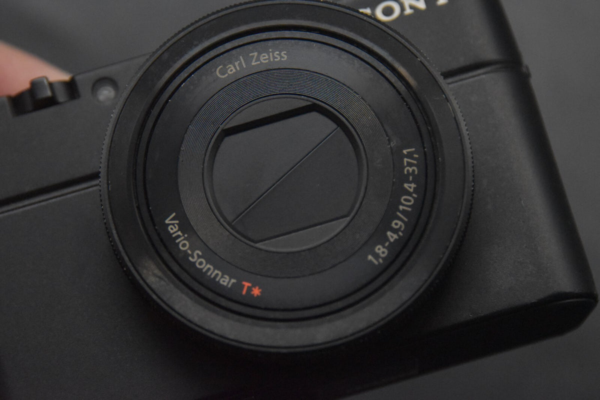 Sony Cyber-Shot DSC-RX100 35 Language Camera #11933-11934