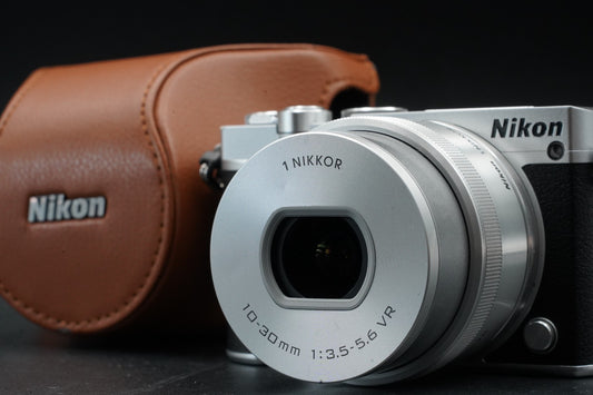 Nikon 1 J5 Silver w/ 10-30mm Lens Mirrorless Camera -988 cuts- #11477