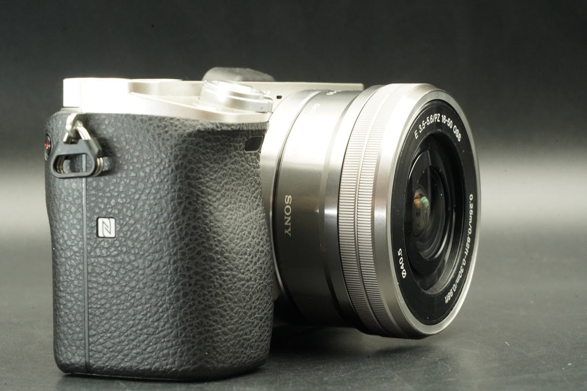 Sony a6000 Digital Camera Silver w/ 16-50 + 55-210mm -12773 cut- #12446