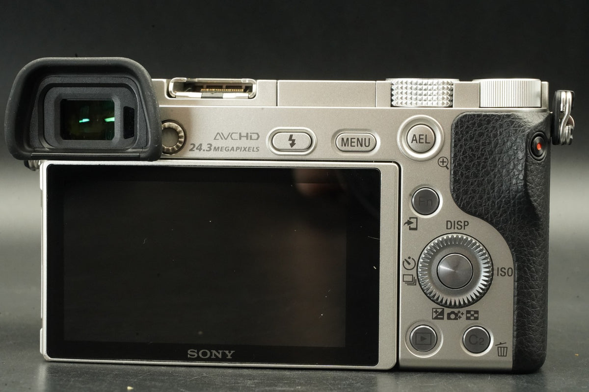 Sony a6000 Digital Mirrorless Camera Silver w/ 16-50mm Lens -3320 cut- #12564
