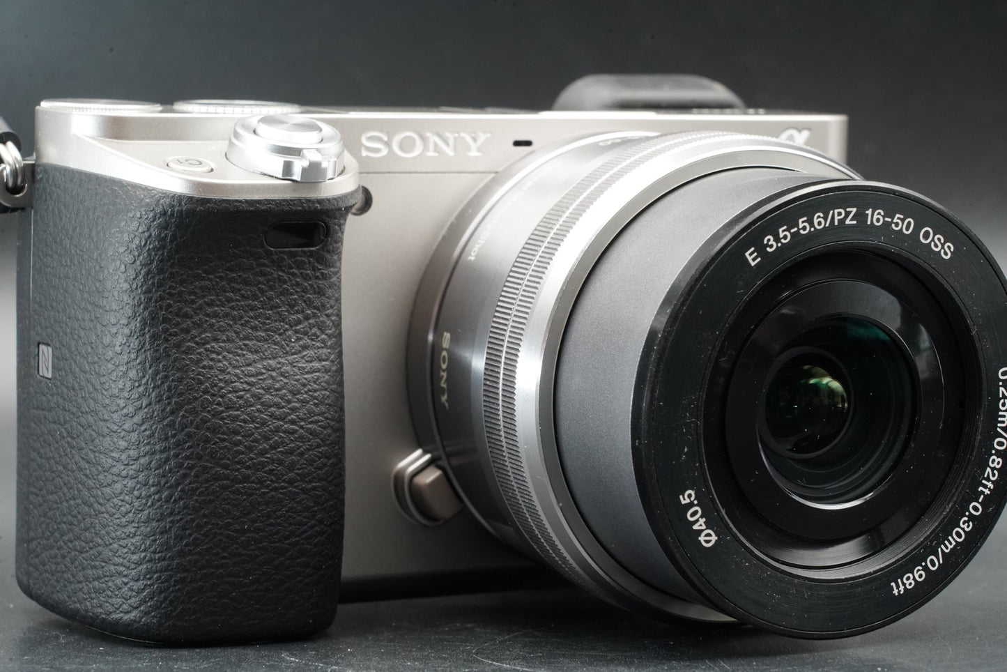 1761 cuts! Sony a6000 Digital Mirrorless Camera Silver w/ 16-50 + 55-210mm 11486