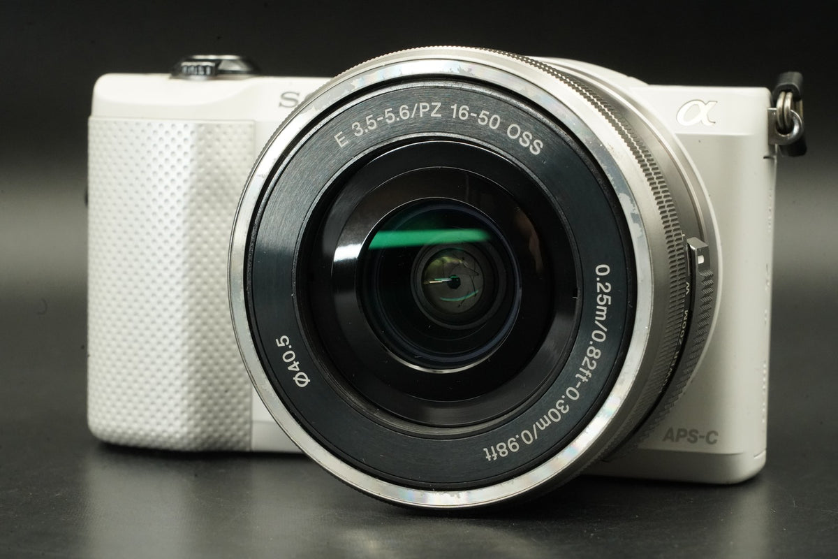 Sony a5000 Digital Camera White with 14-42mm + 55-210mm Lens -3359 cuts- #12364