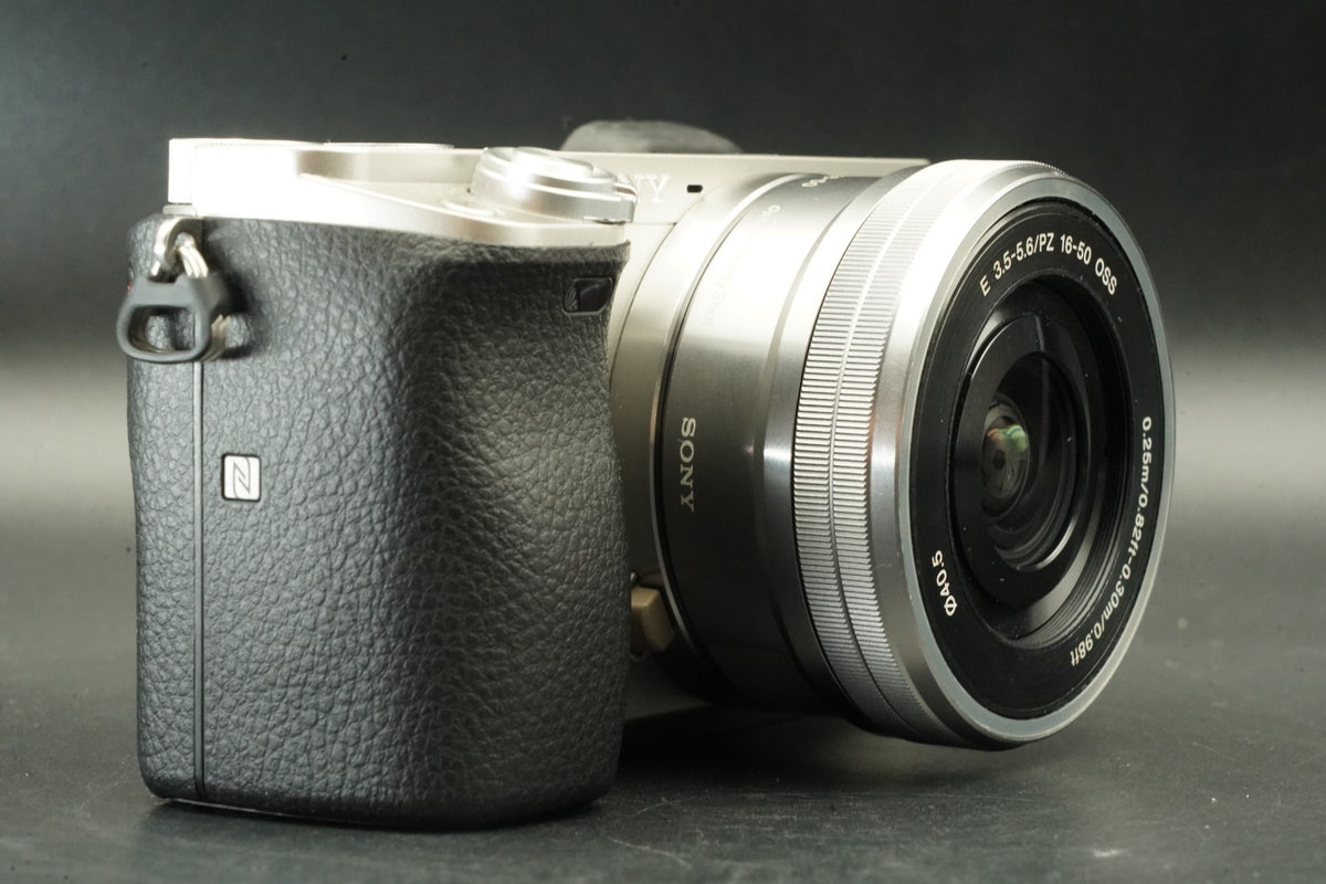 Sony a6000 Digital Mirrorless Camera Silver w/ 16-50mm Lens -778 cut- #12533