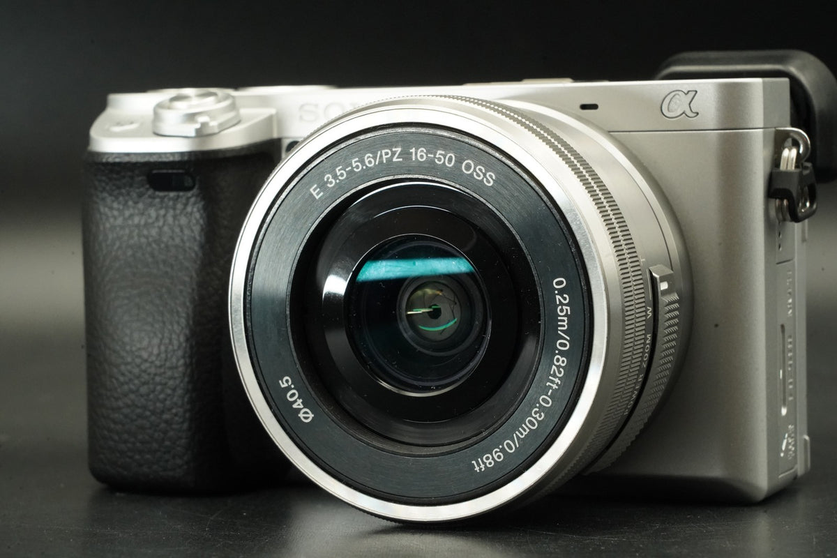 Sony Alpha A6400 Mirrorless Digital Camera with Lens Silver -87045 cuts- #12008