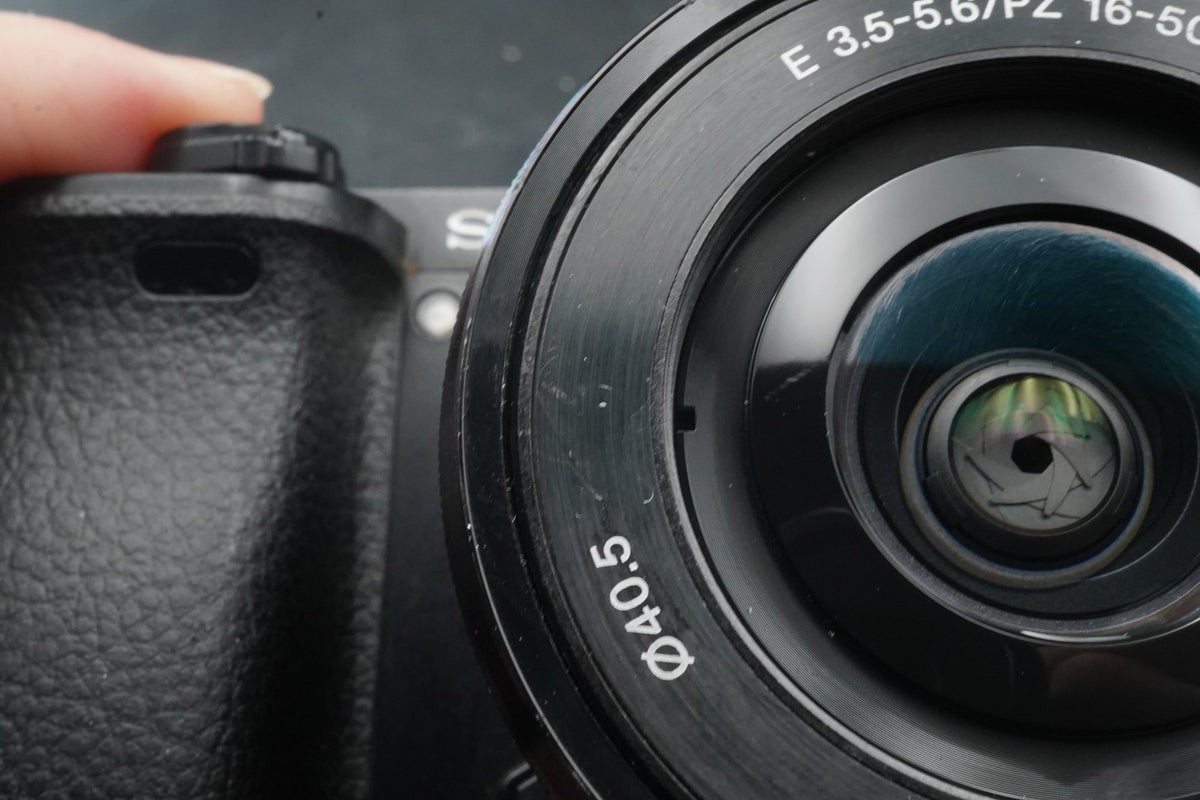 Sony alpha a6000 Digital Mirrorless Camera with Lens Black -75302 cuts- #11206