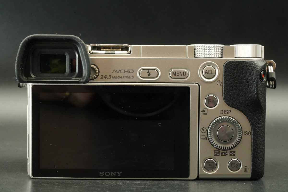Sony a6000 Digital Mirrorless Camera Silver w/ 16-50mm Lens -778 cut- #12533