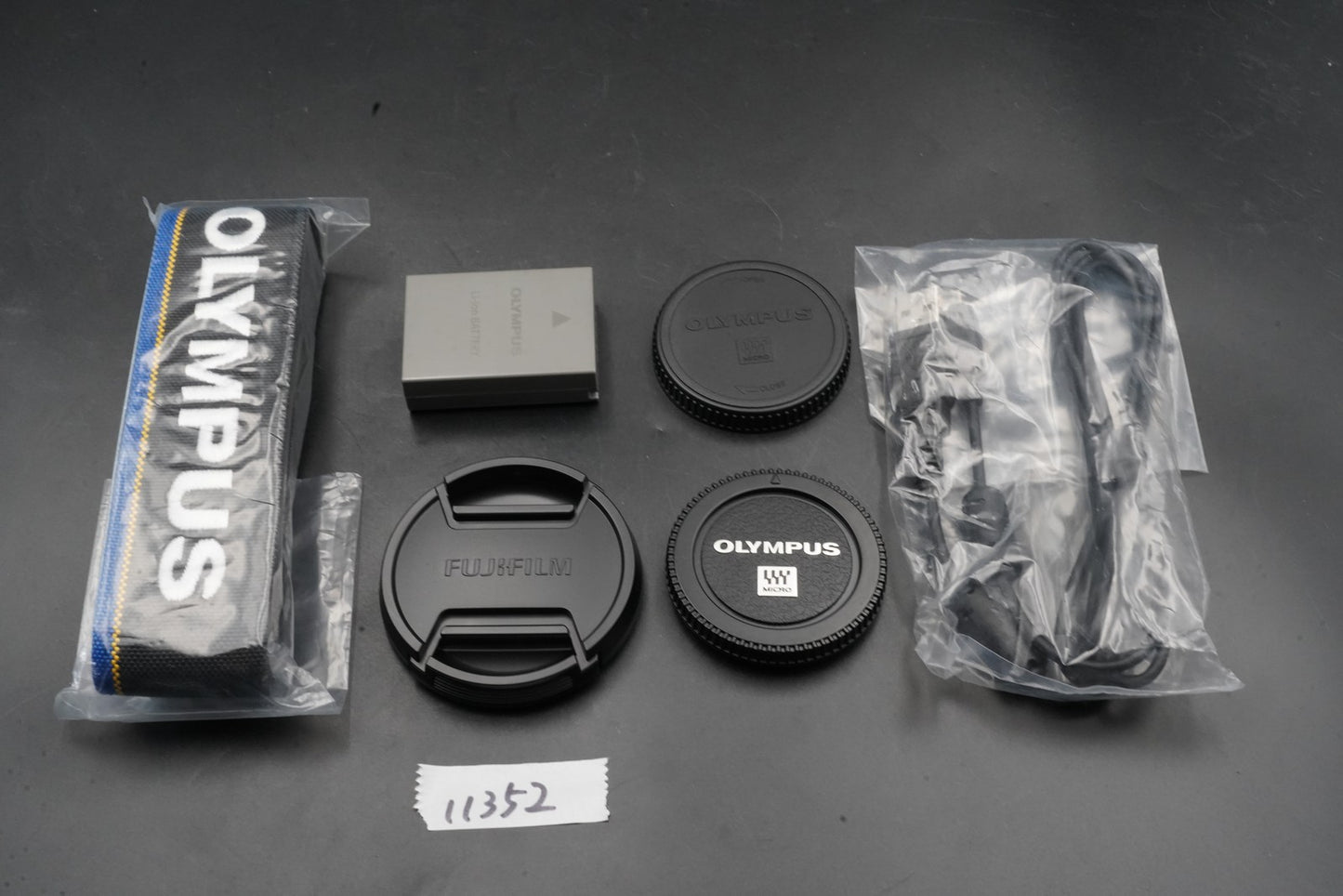 5508 cuts! Olympus OM-D E-M1 Digital Camera Black + 12-40mm PRO Lens 11352