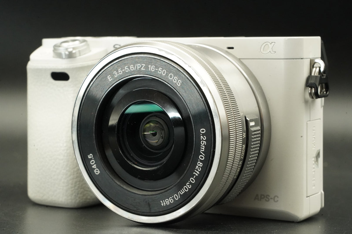 Sony a6000 Digital Camera White w/ 16-50 + 55-210mm -14850 cut US STOCK #12011
