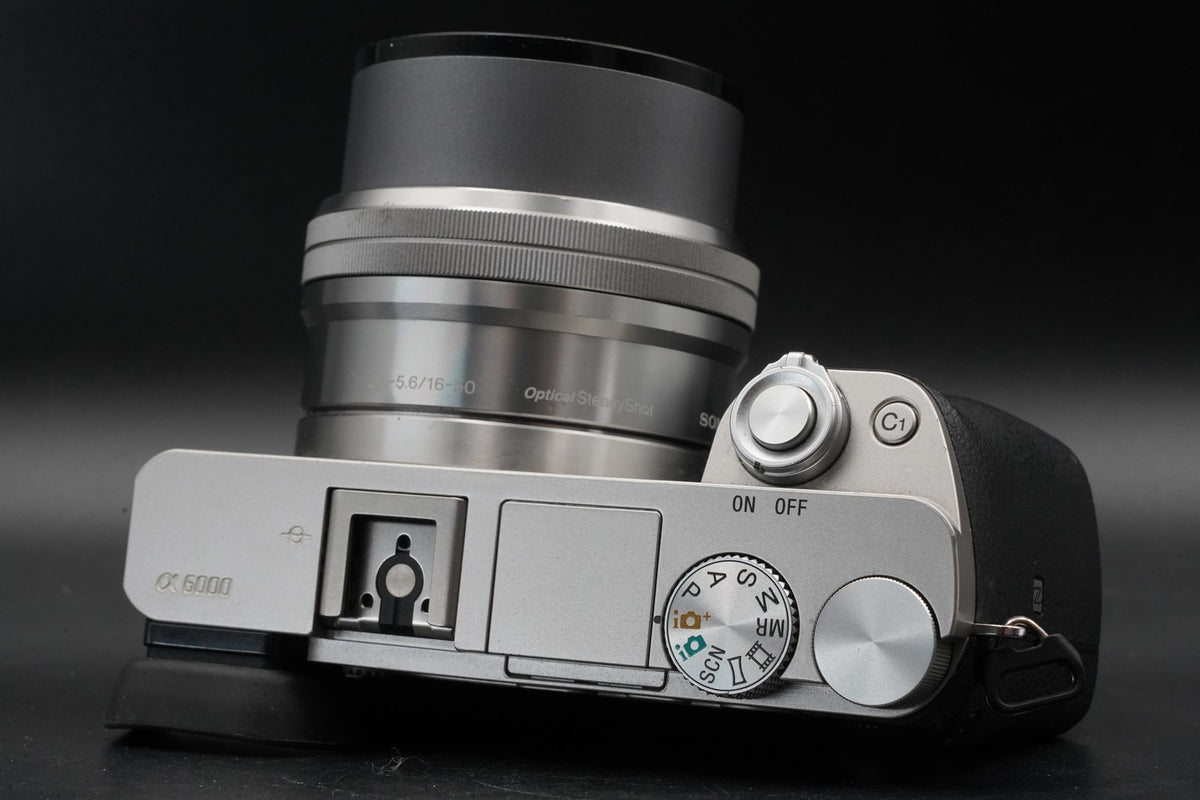Sony a6000 Digital Mirrorless Camera Silver w/ 16-50 + 55-210mm -8463 cut #12193