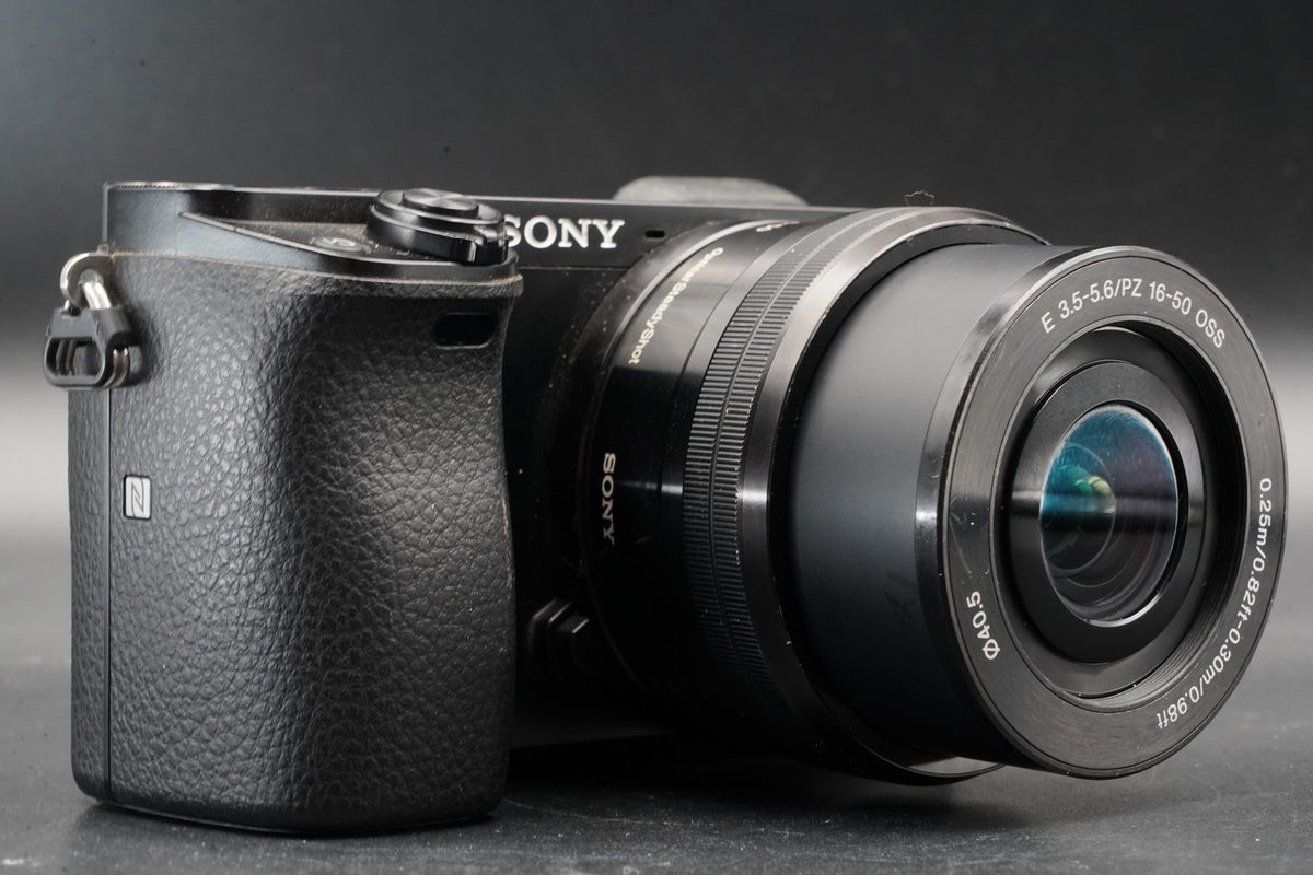 Sony alpha a6000 Digital Mirrorless Camera with Lens Black -75302 cuts- #11206