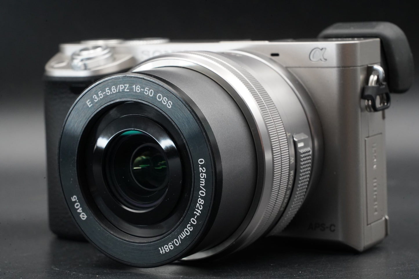 1761 cuts! Sony a6000 Digital Mirrorless Camera Silver w/ 16-50 + 55-210mm 11486