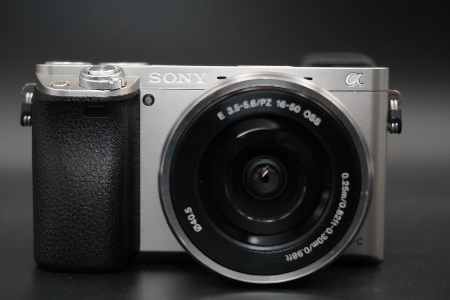 3411 cuts! Sony a6000 Digital Mirrorless Camera Silver w/ 16-50 + 55-210mm 10371