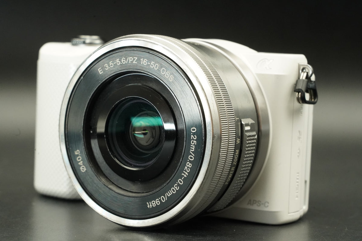 Sony a5000 Digital Camera White with 14-42mm + 55-210mm Lens -6879 cuts- #12362