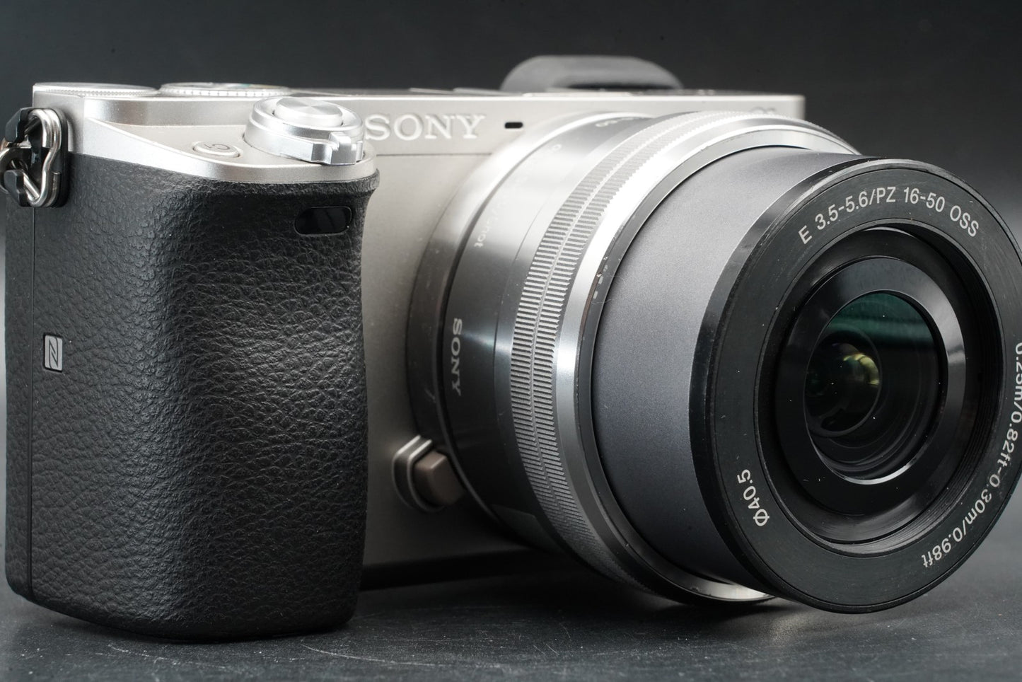2374 cuts! Sony a6000 Digital Mirrorless Camera Silver w/ 16-50 + 55-210mm 11485