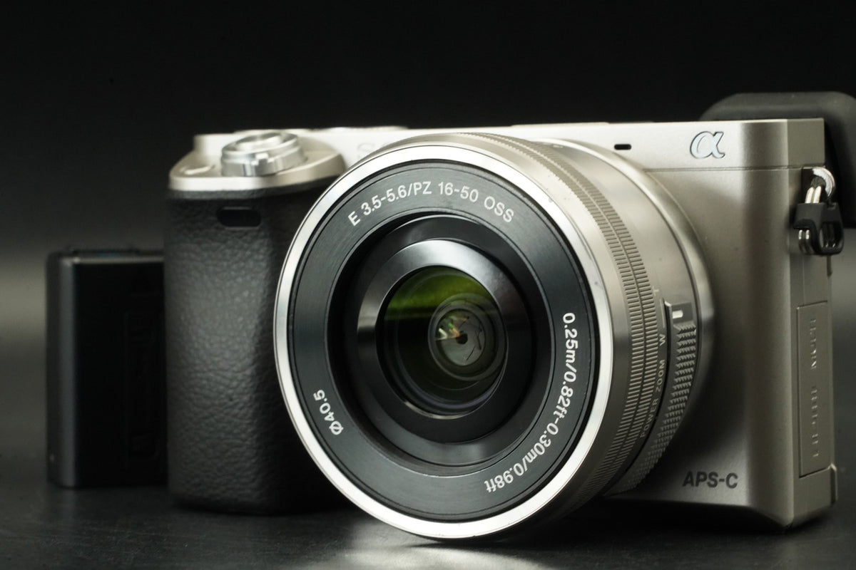 Sony a6000 Digital Mirrorless Camera Silver w/ 16-50mm Lens -3320 cut- #12564
