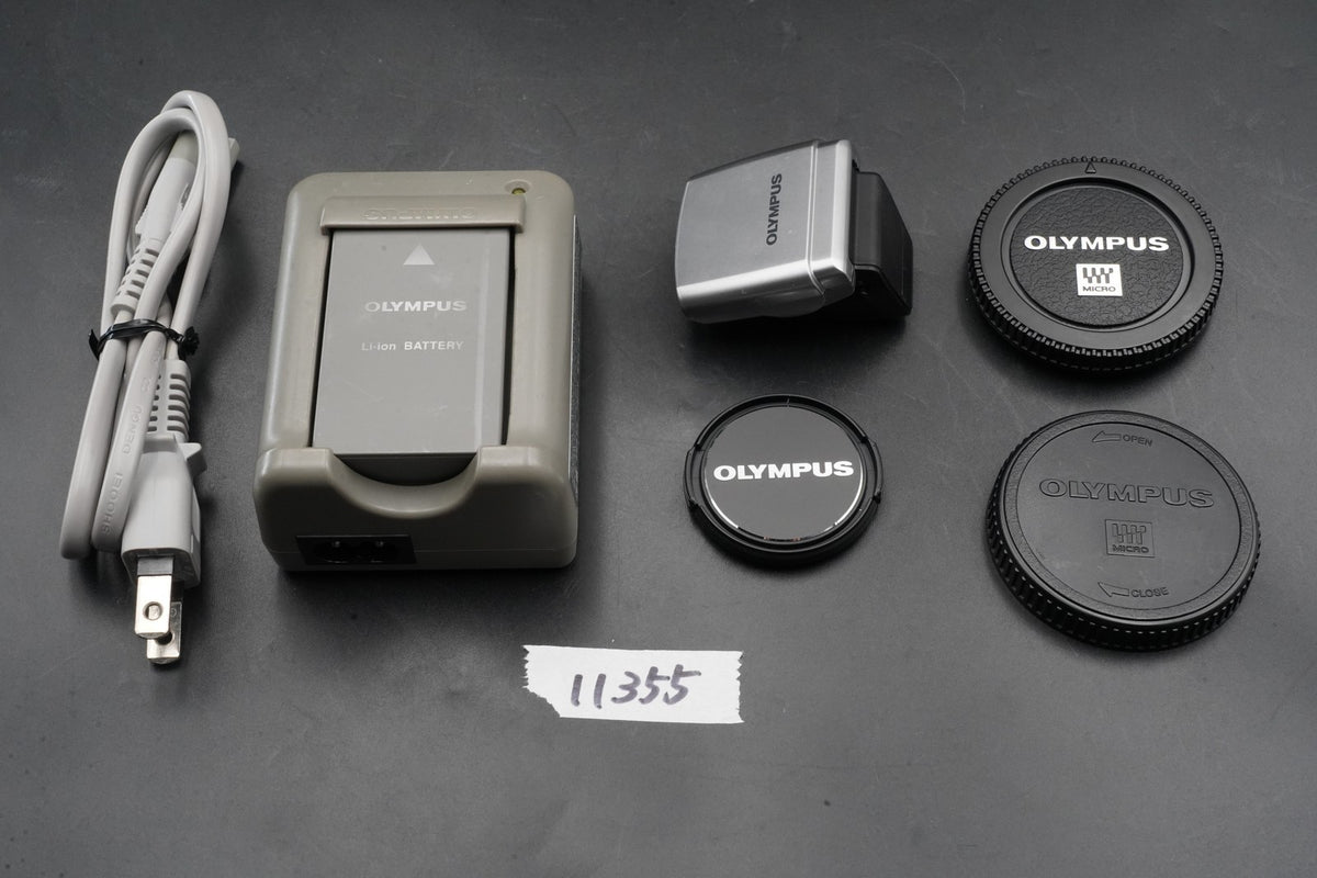 Olympus E-PL8 con obiettivo 40-150 mm fotocamera digitale argento US STOCK...