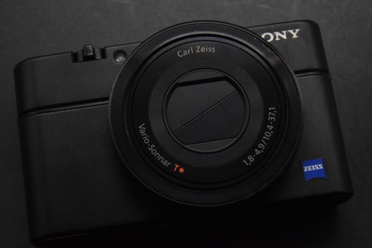 Sony Cyber-Shot DSC-RX100 35 Language Camera #11933-11934
