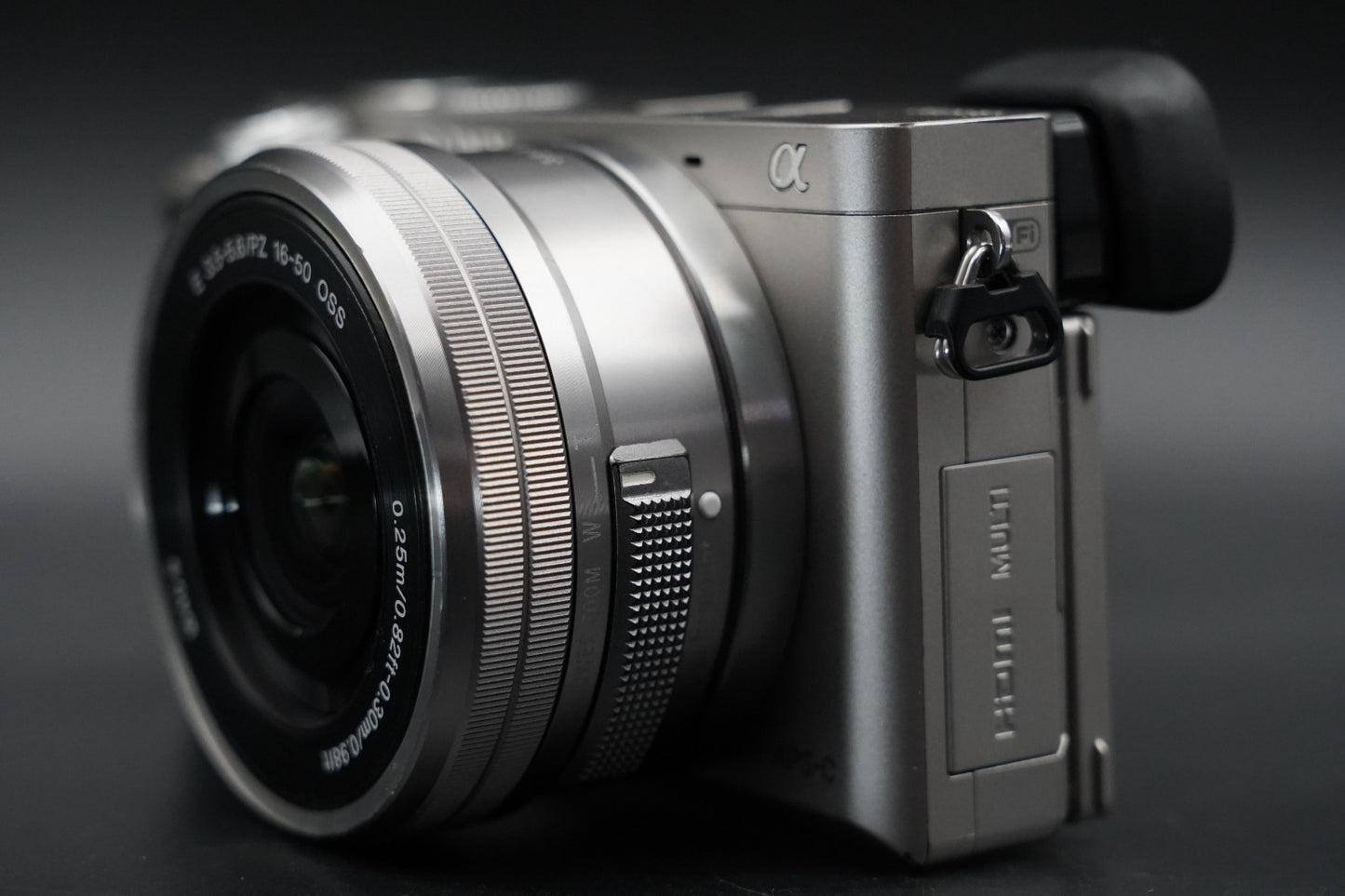 3411 cuts! Sony a6000 Digital Mirrorless Camera Silver w/ 16-50 + 55-210mm 10371