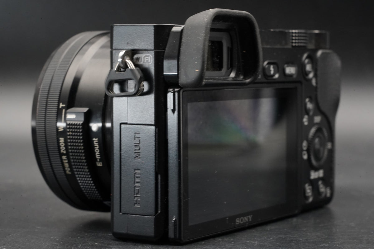 Sony alpha a6000 Digital Mirrorless Camera with Lens Black -75302 cuts- #11206