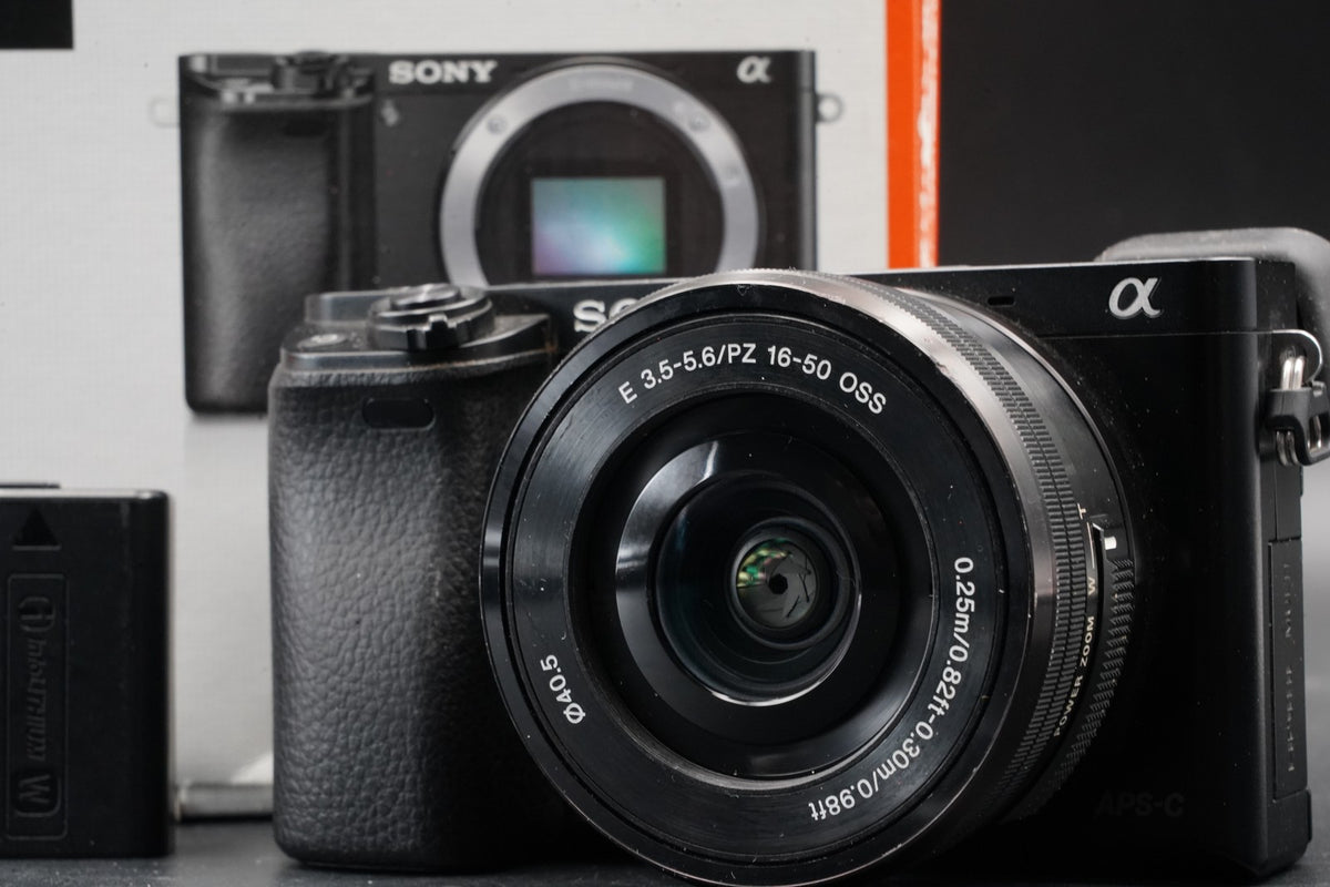 Sony alpha a6000 Digital Mirrorless Camera with Lens Black -75302 cuts- #11206