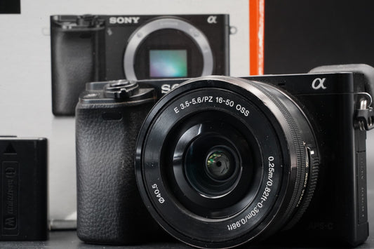 Sony alpha a6000 Digital Mirrorless Camera with Lens Black -75302 cuts- #11206