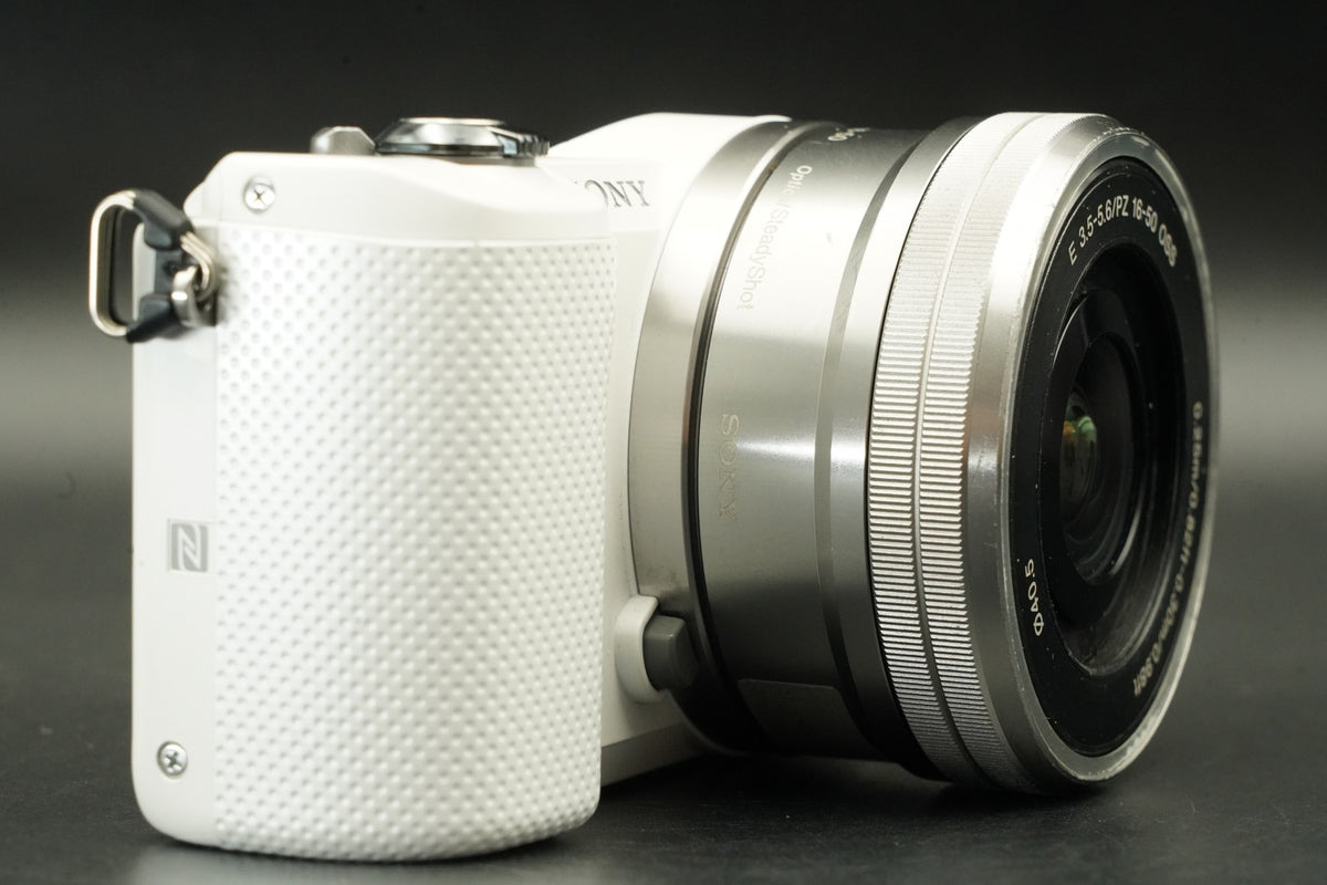 Sony a5000 Digital Camera White with 14-42mm + 55-210mm Lens -6879 cuts- #12362