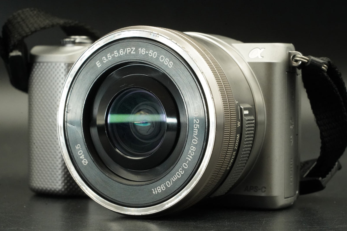 Sony a5000 Digital Camera Silver w/ 16-50 + 55-210mm -1277 cut US STOCK #12029