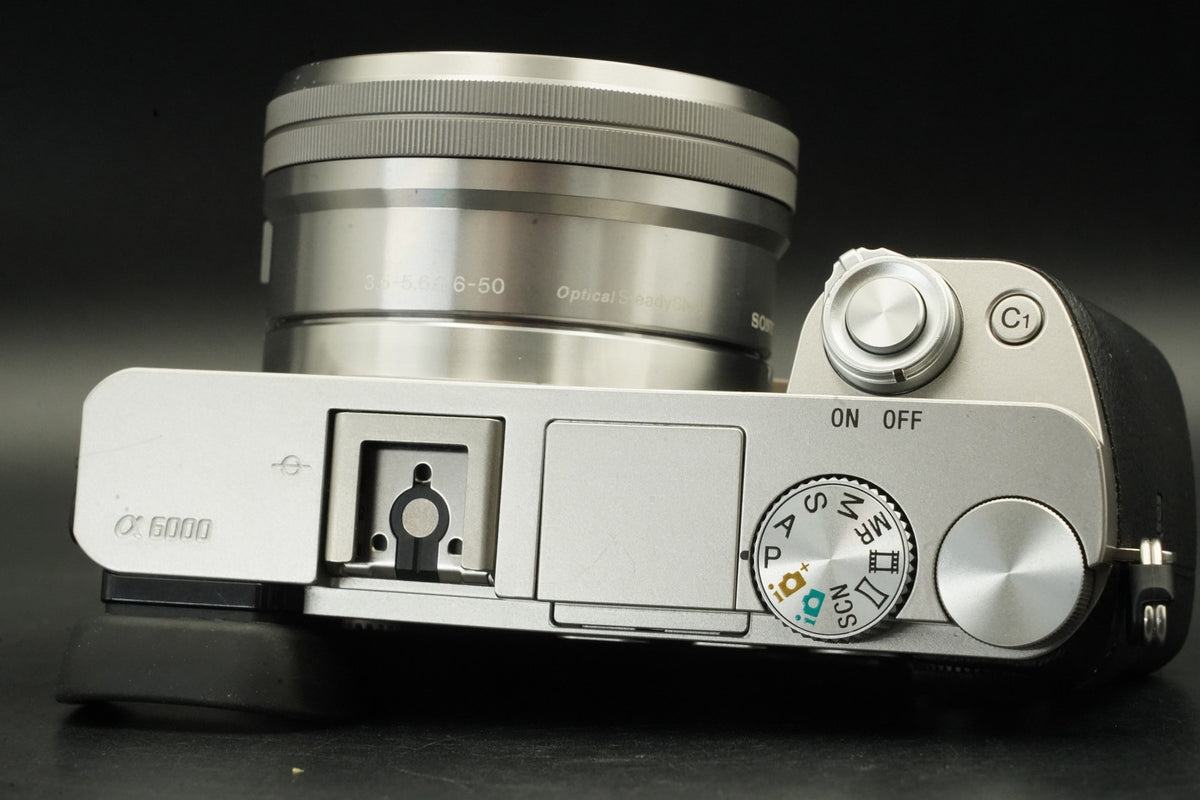 Sony a6000 Digital Mirrorless Camera Silver w/ 16-50mm Lens -3320 cut- #12564