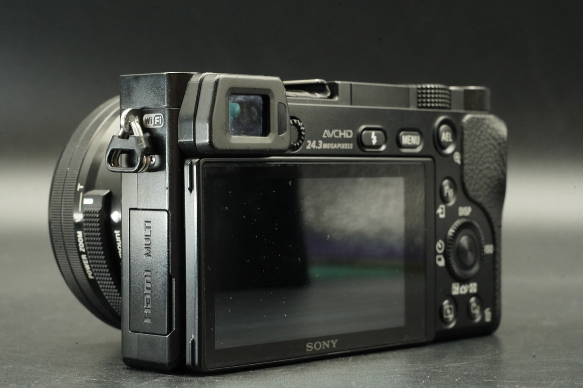 Sony a6000 Digital Mirrorless Camera Black w/ 16-50 + 55-210mm -24585 cut #12012
